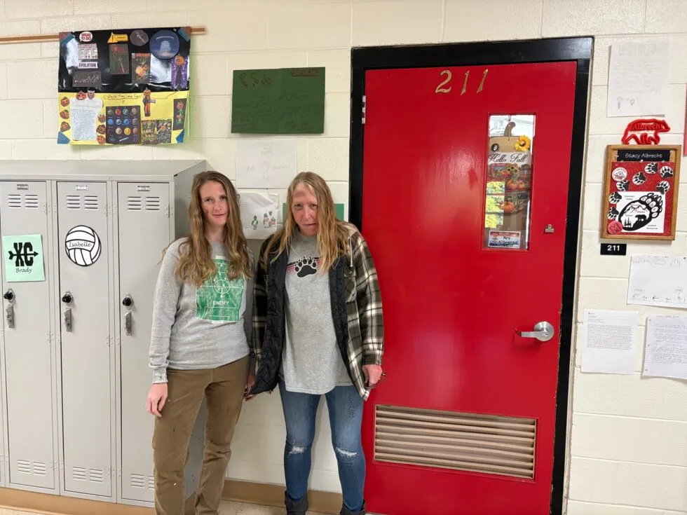 Two teachers acting like zombies