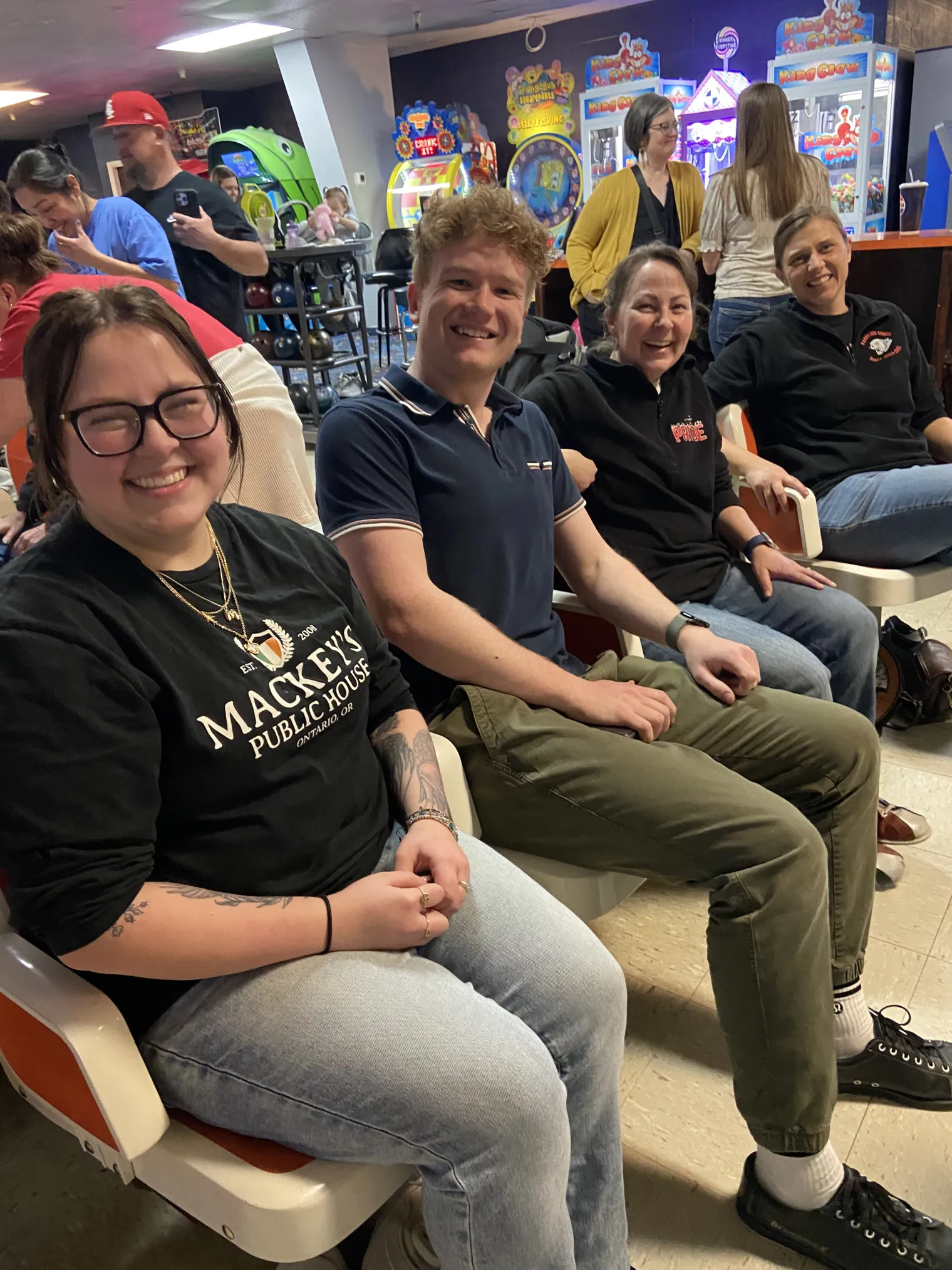 A group of people at a bowling alley