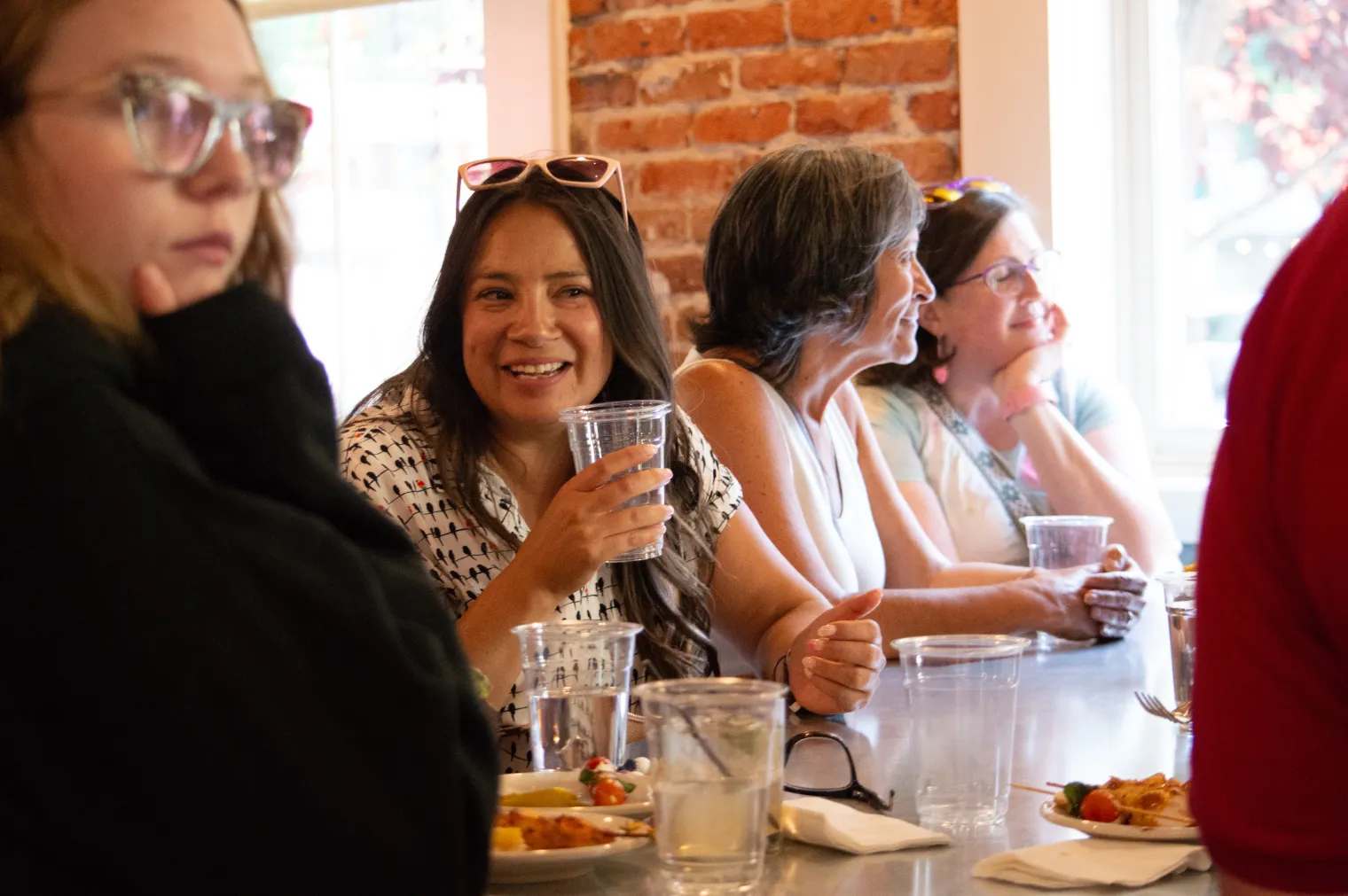 A group of people gathered around a table