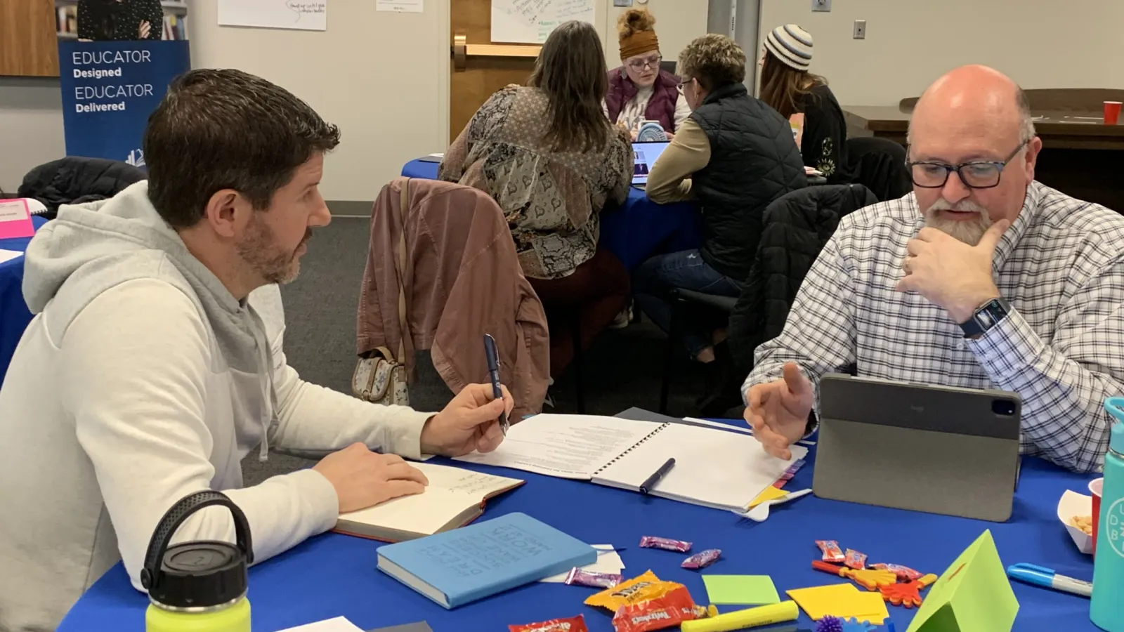 two men working at a table