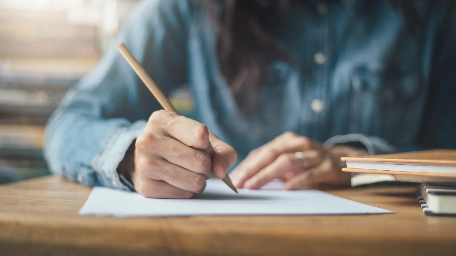 A detail photo of a woman taking an exam