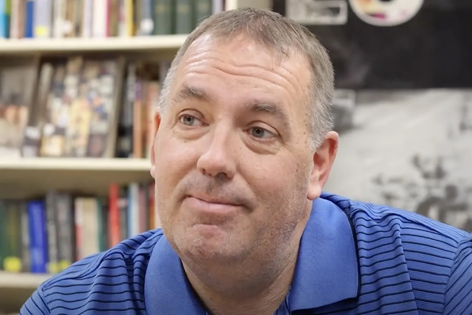A close up of a man smiling. 