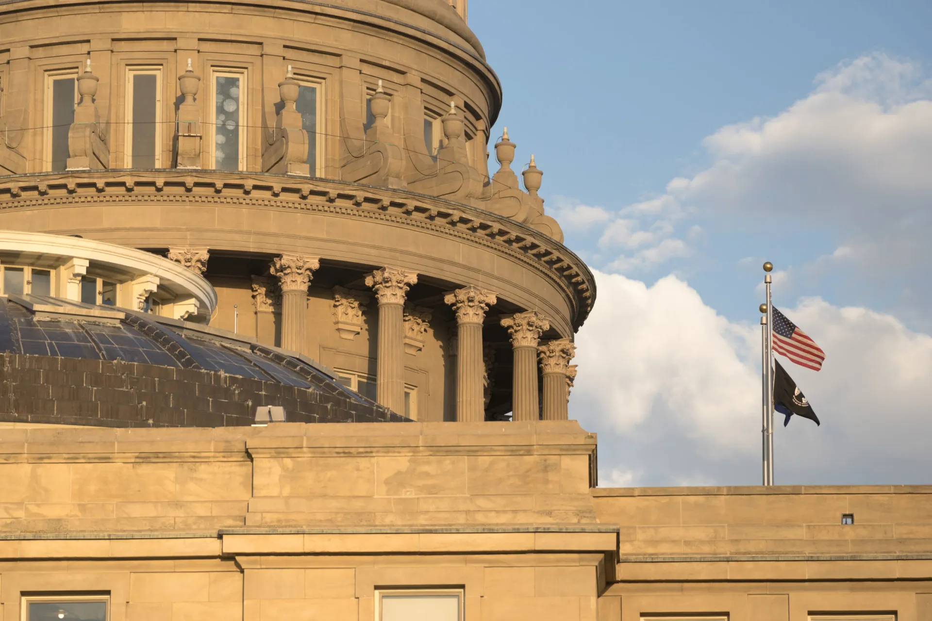 The Idaho Statehouse against a partly cloudy sky