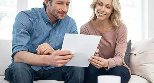 couple looking at doc