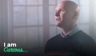 Anthony Doerr is pictured along with the words "I am curious"