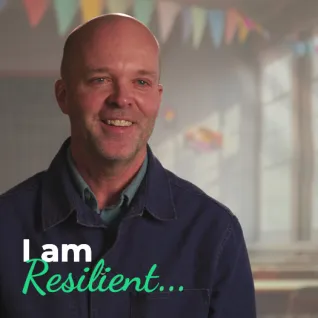 Ryan Peck is pictured along with the text "I am resilient"