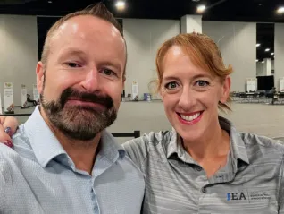 A man and a woman pose for a selfie