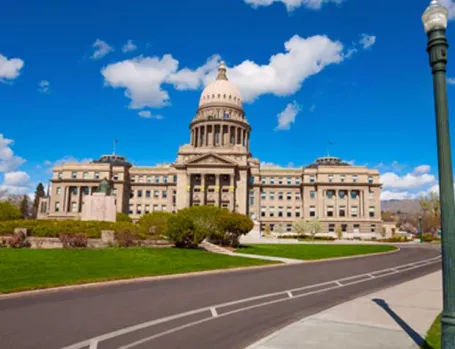 A view of the Idaho Statehouse on a sunny day