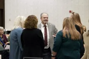 A lawmaker speaks to IEA members