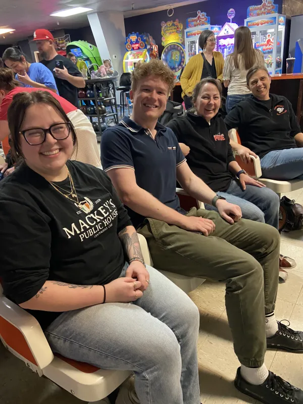 A group of people at a bowling alley