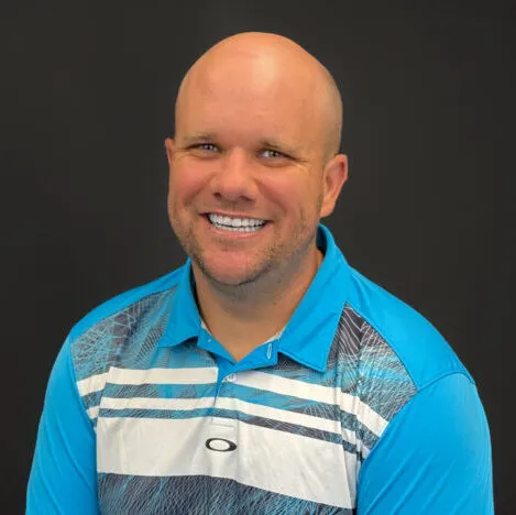 A man wearing a striped shirt