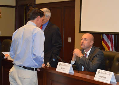 Matt Compton speaks with Rep. Reed DeMourdant