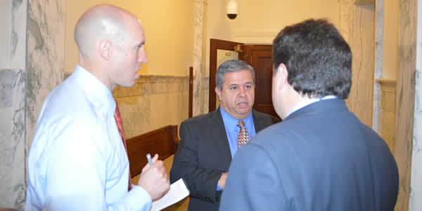 Superintendent Tom Luna discusses his budget request with AP reporter John Miller and deputy bureau chief Jason Hancock